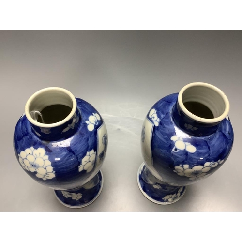 372 - A pair of Chinese blue and white vases, Kangxi mark c.1900, height 22.5cm