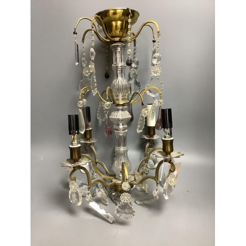 402 - A French boudoir four-light chandelier with clear and amethyst glass pendant drops and a similar pai... 