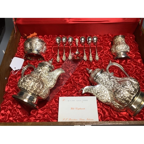 411 - An Indonesian white metal (stamped 800) tea service (cased)