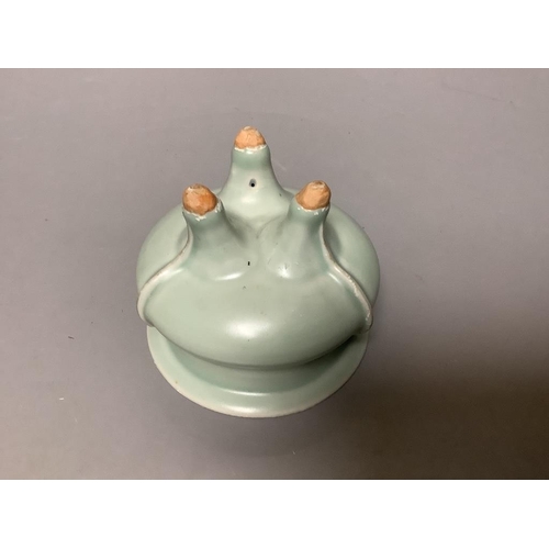 426 - A Chinese celadon glazed tripod censer, diameter 11cm