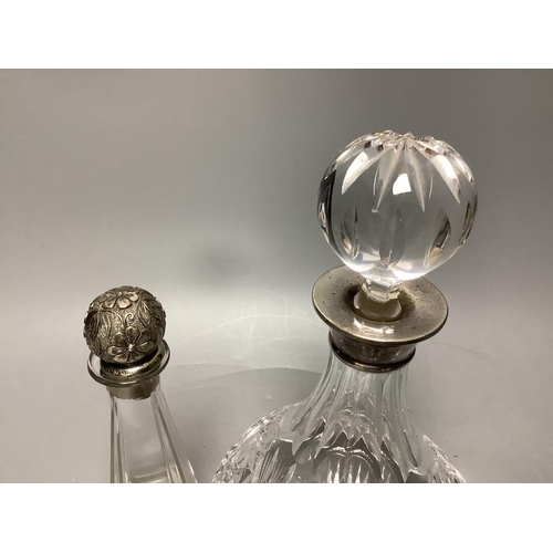 443 - A silver collared cut glass decanter and a glass scent bottle with 800 standard silver stopper, tall... 