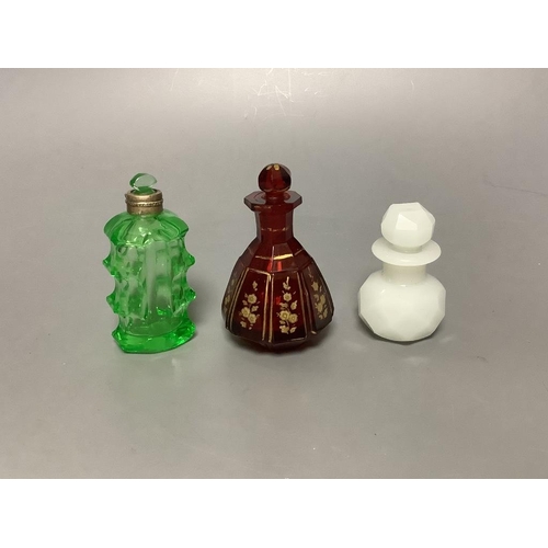 457 - Eight overlaid glass scent bottles