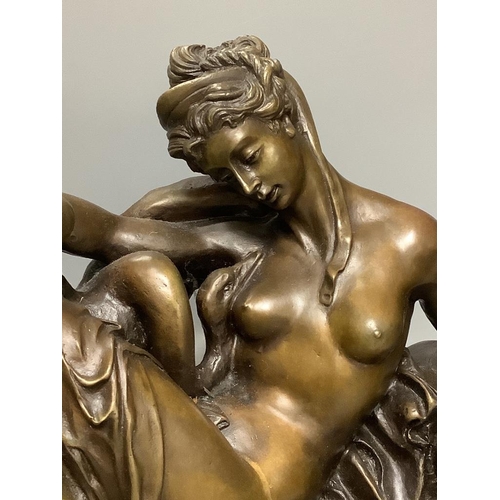 458 - A cold cast resin bronze of Leda and the swan, on marble base, length 48cm