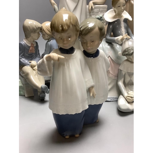 469 - Four Nao figures and a Lladro group