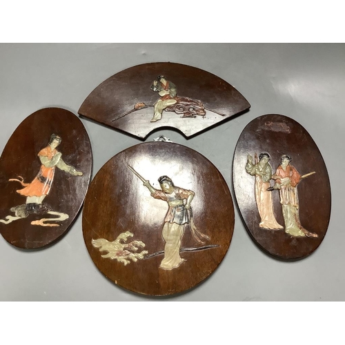 471 - A Chinese engraved and stained bone plaque and four shibayama plaques