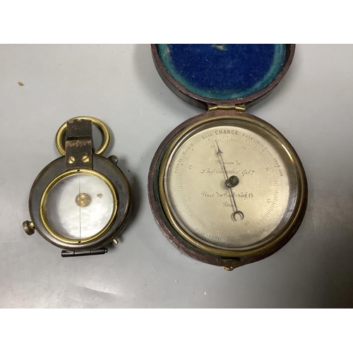 513 - A pocket barometer, a compass, a 19th century desk stand and a photograph frame