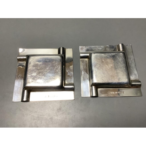 708 - A pair of modern part engine turned silver ashtrays, 95 mm, 176 g and a silver and Wedgwood plaque m... 