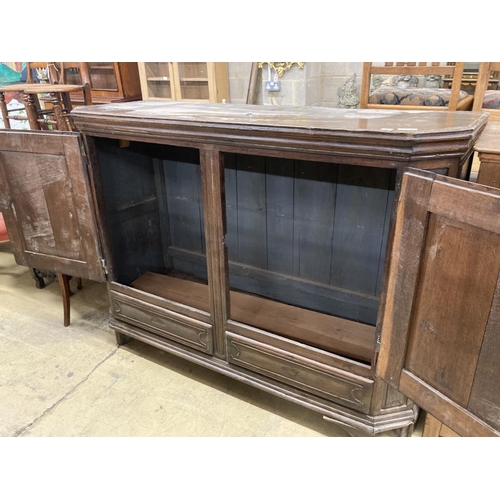 82 - A Dutch oak two door cabinet, width 170cm, depth 60cm, height 124cm