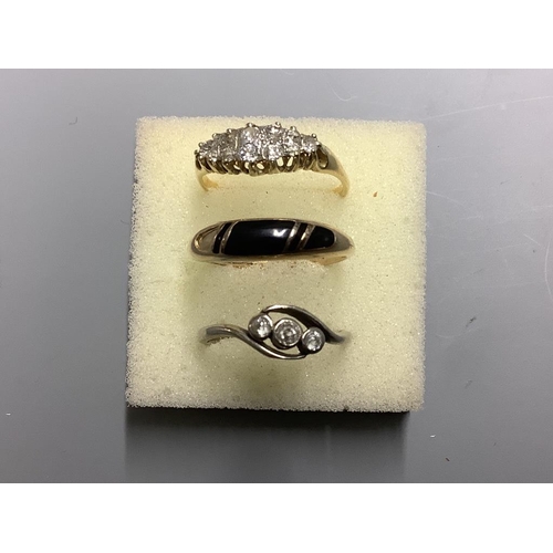 822 - Two 18ct and diamond set rings, gross 5.7 grams and an enamelled ring (a.f.).