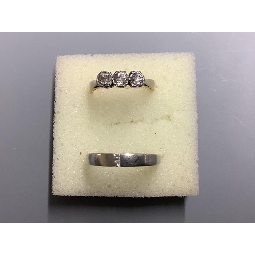 823 - An 18ct and plat, three stone diamond ring, size L gross 2.6 grams and a 9ct white metal and diamond... 