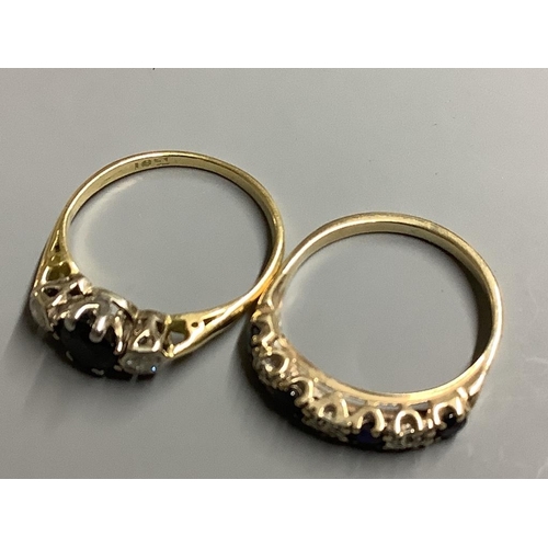 824 - Two yellow metal, sapphire and diamond rings,one stamped 18ct, gross 5.2 grams.