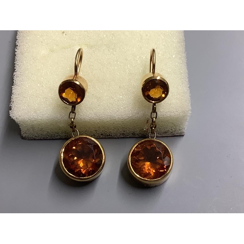 867 - A pair of yellow metal and two stone citrine set drop earrings,25mm, gross 5.7 grams.... 