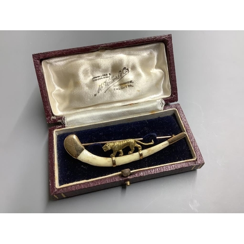 870 - An Indian 14ct and bone mounted 'tiger' set curved brooch, by Hamilton & Co, in original box,7cm, gr... 