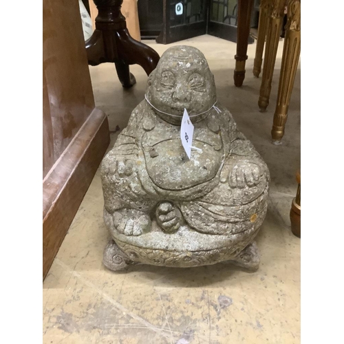 88 - A reconstituted stone Buddha garden ornament, height 28cm