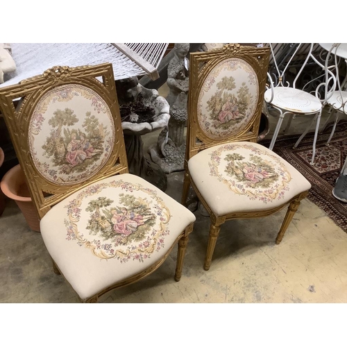 92 - A set of six French giltwood and gesso tapestry back chairs (two with arms)