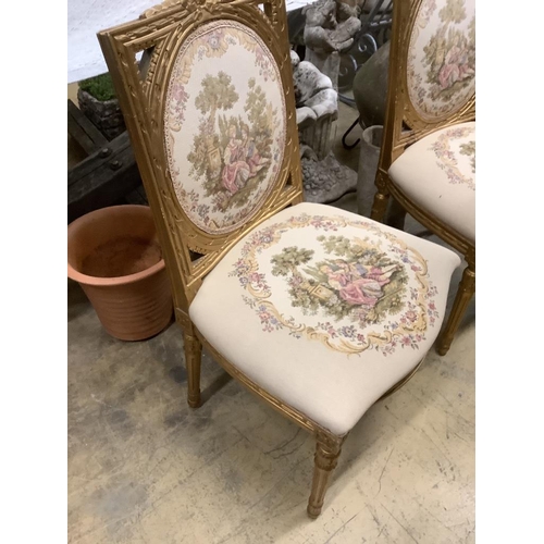 92 - A set of six French giltwood and gesso tapestry back chairs (two with arms)