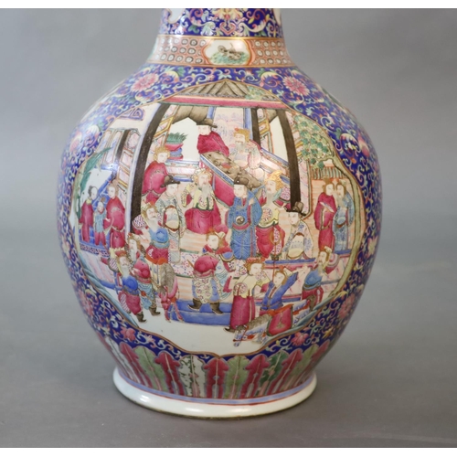 107 - A massive Chinese famille rose blue ground bottle vase, Daoguang period (1821-50),well painted to sh... 