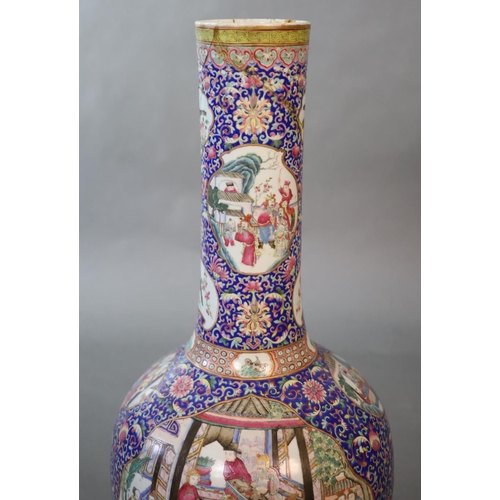 107 - A massive Chinese famille rose blue ground bottle vase, Daoguang period (1821-50),well painted to sh... 