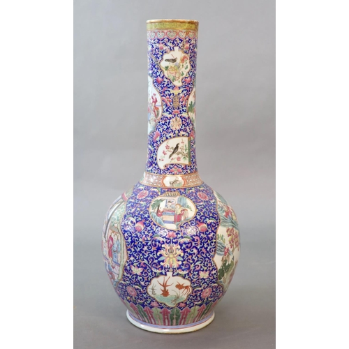 107 - A massive Chinese famille rose blue ground bottle vase, Daoguang period (1821-50),well painted to sh... 