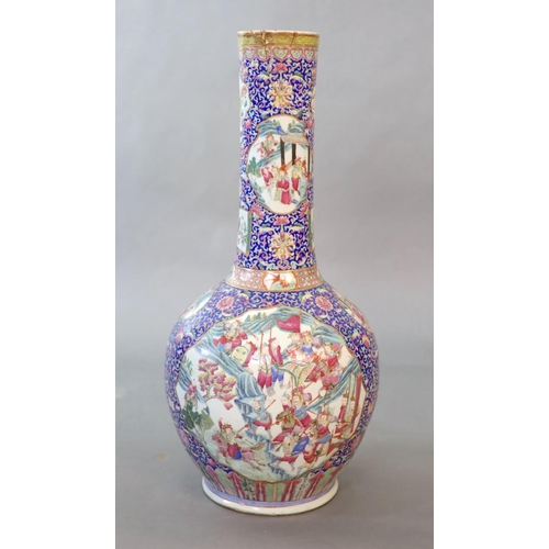 107 - A massive Chinese famille rose blue ground bottle vase, Daoguang period (1821-50),well painted to sh... 