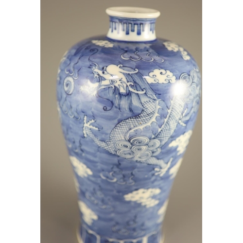 108 - A Chinese blue and white 'dragon' meiping, Kangxi mark but 19th century,painted with dragons chasing... 