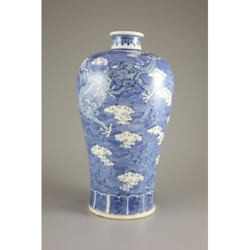 108 - A Chinese blue and white 'dragon' meiping, Kangxi mark but 19th century,painted with dragons chasing... 