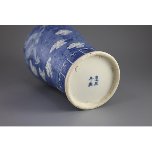 108 - A Chinese blue and white 'dragon' meiping, Kangxi mark but 19th century,painted with dragons chasing... 