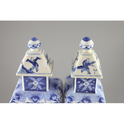 111 - A pair of Chinese blue and white rectangular baluster vases and covers, Kangxi marks but 19th centur... 