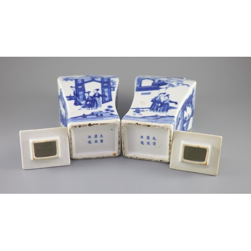 111 - A pair of Chinese blue and white rectangular baluster vases and covers, Kangxi marks but 19th centur... 