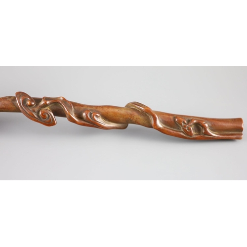 118 - A Chinese boxwood ruyi sceptre, 18th/19th century,carved as lingzhi fungus, warm caramel brown patin... 