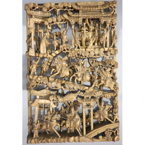 124 - A pair of Chinese giltwood panels, late 19th centuryeach carved with battle scenes with dignitaries ... 