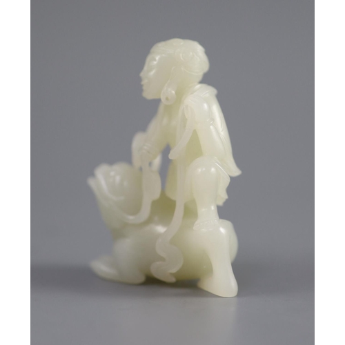 131 - A good Chinese pale celadon jade group of Liu Hai and the three legged toad, 18th century,finely car... 