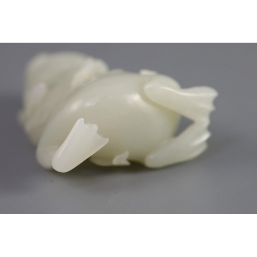 131 - A good Chinese pale celadon jade group of Liu Hai and the three legged toad, 18th century,finely car... 