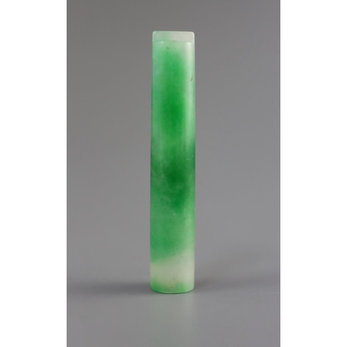 142 - A Chinese jadeite official's hat plume holder,the ice white stone with emerald green inclusions,7cm... 