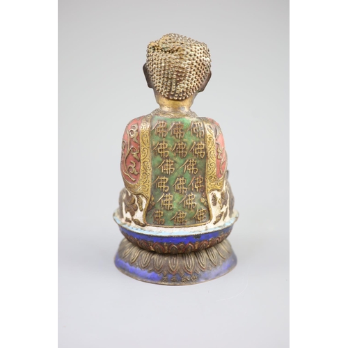 158 - A Chinese copper alloy and enamel seated figure of Buddha Shakyamuni, Qing dynasty,on a double lotus... 