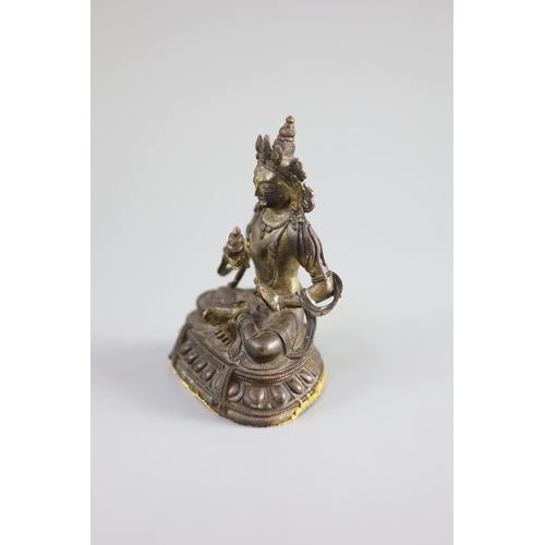 160 - A Chinese gilt bronze figure of Amitayus, Qianlong mark and period (1736-95),holding a vessel in his... 