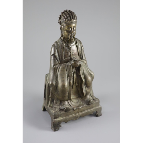 164 - A Chinese bronze seated figure of Wenchang Wang, late Ming dynasty, 17th century,on a stepped base w... 