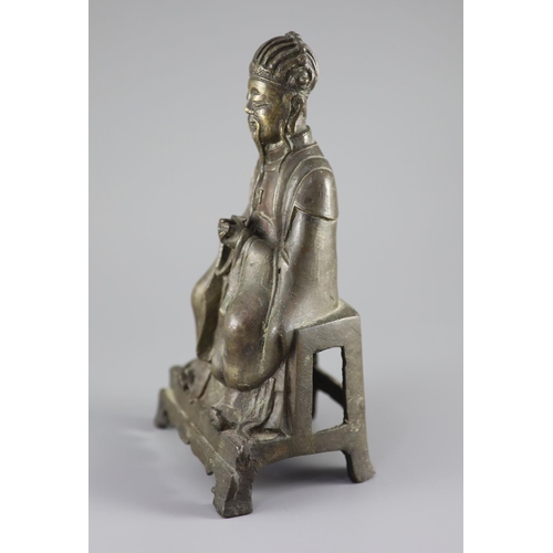 164 - A Chinese bronze seated figure of Wenchang Wang, late Ming dynasty, 17th century,on a stepped base w... 