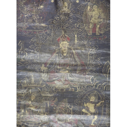 165 - A Tibetan Buddhist thangka, 17th /18th century,depicting Padmasambhava seated on a lotus throne, sur... 