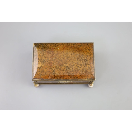 17 - A German ormolu mounted agate casket, 19th century,with chased scrolling escutcheon, raised on polis... 