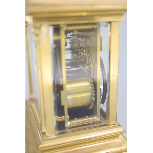 180 - A large hour repeating architectural cased carriage clock, late 19th centurythe white enamelled dial... 