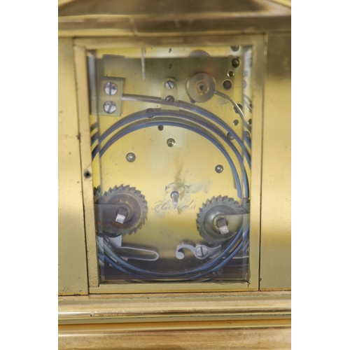 180 - A large hour repeating architectural cased carriage clock, late 19th centurythe white enamelled dial... 