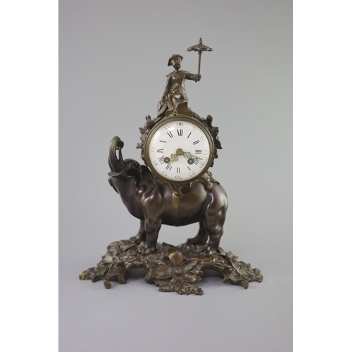 183 - A 19th century Louis XV style bronze pendule a lelephant,modelled with a Chinese figure seated ab... 