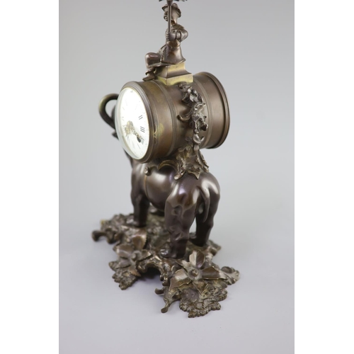 183 - A 19th century Louis XV style bronze pendule a lelephant,modelled with a Chinese figure seated ab... 