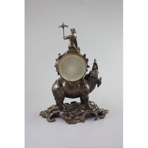 183 - A 19th century Louis XV style bronze pendule a lelephant,modelled with a Chinese figure seated ab... 