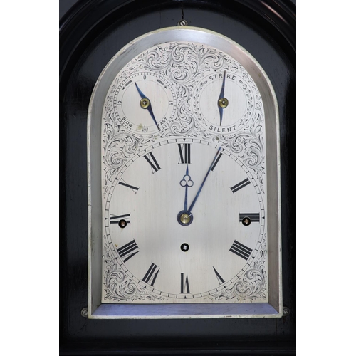 187 - A large late Victorian ebonised bracket clock with bracketthe arched silvered dial with Roman numera... 