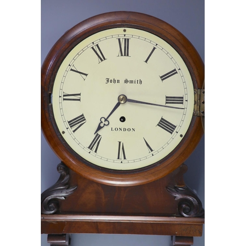 192 - A Victorian mahogany wall clock, the 8" dial marked John Smith, London,in a flamed mahogany c... 