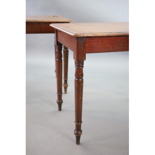 196 - A pair of Victorian mahogany writing tables,with rounded rectangular tops, once fitted with inkwells... 