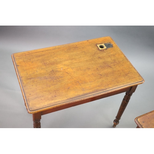 196 - A pair of Victorian mahogany writing tables,with rounded rectangular tops, once fitted with inkwells... 