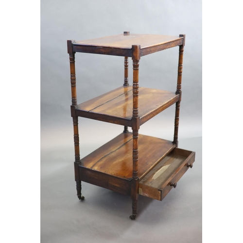 204 - An early Victorian rosewood whatnot,with three stages and base drawer, on ring turned tapered legs a... 